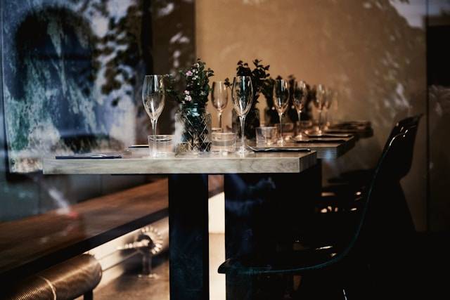 A fine dining restaurant table with wine glasses