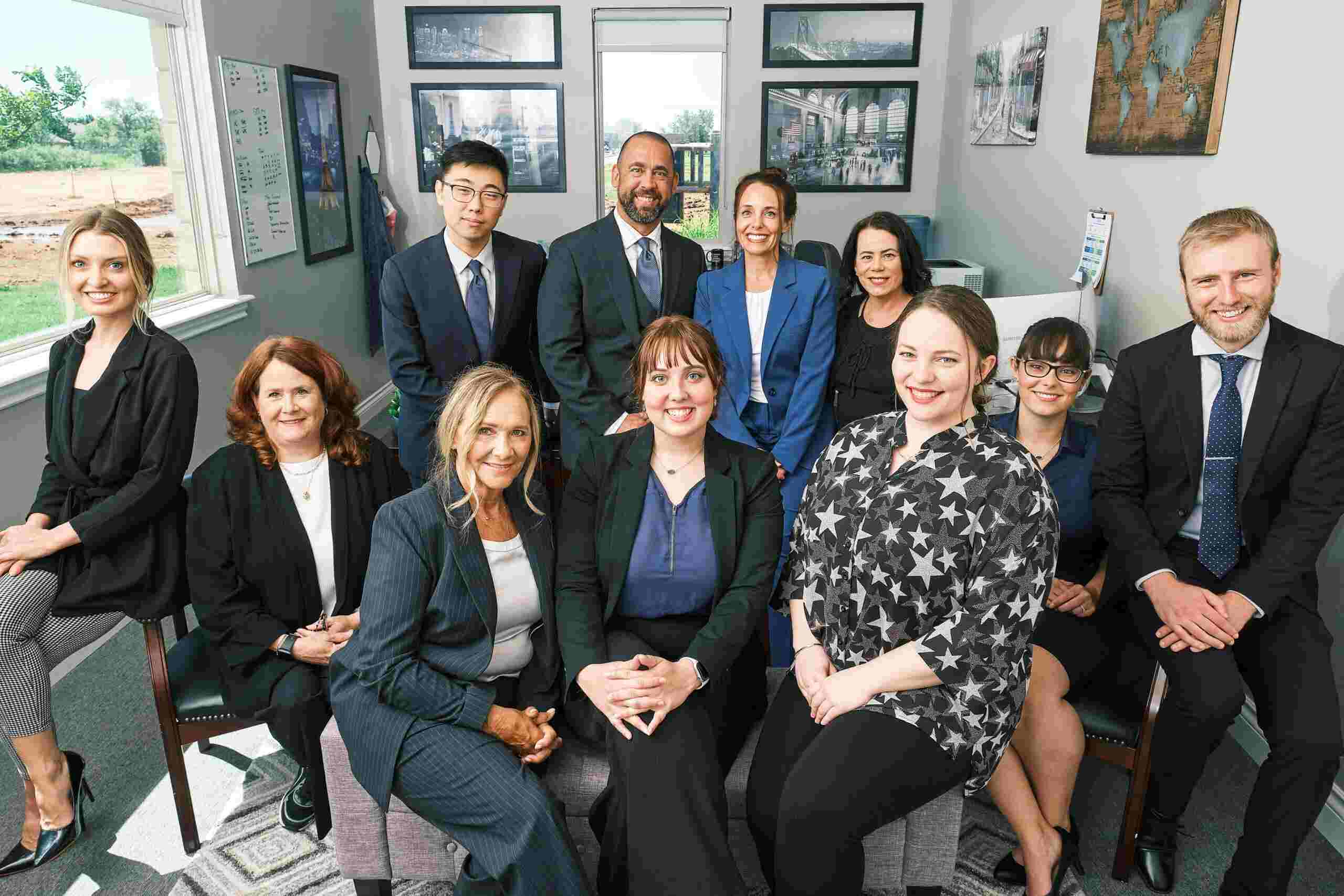A group shot of the Vertices accounting, tax, and business consulting team in professional attire