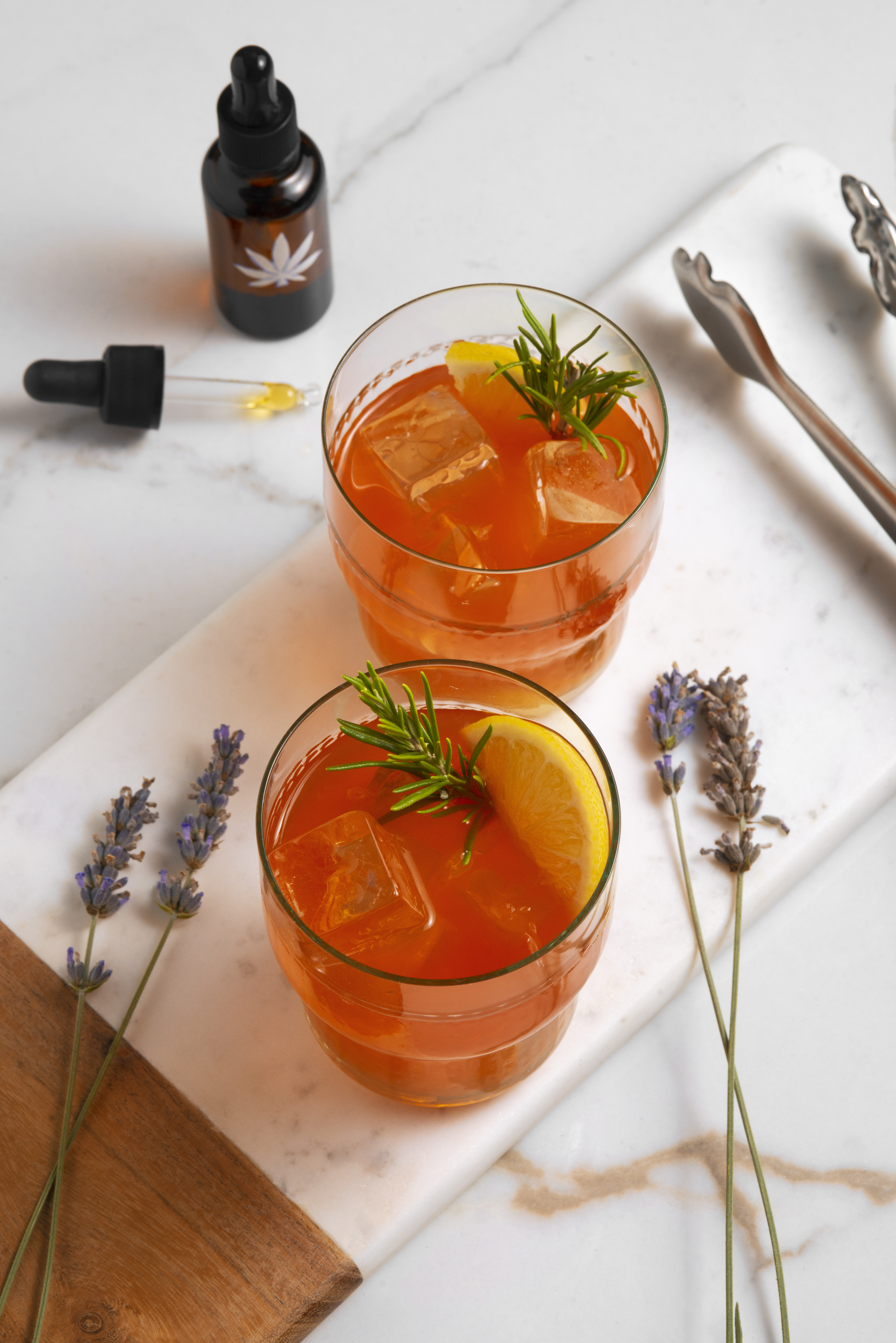 Two alcoholic beverages on a white table