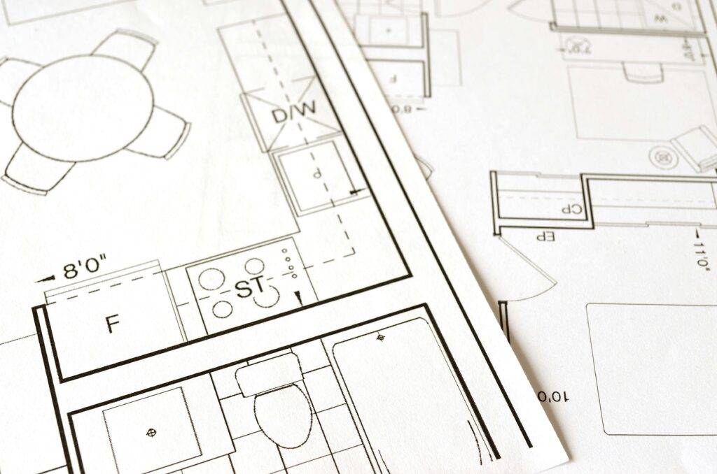 Close up shot of construction floor plan documents