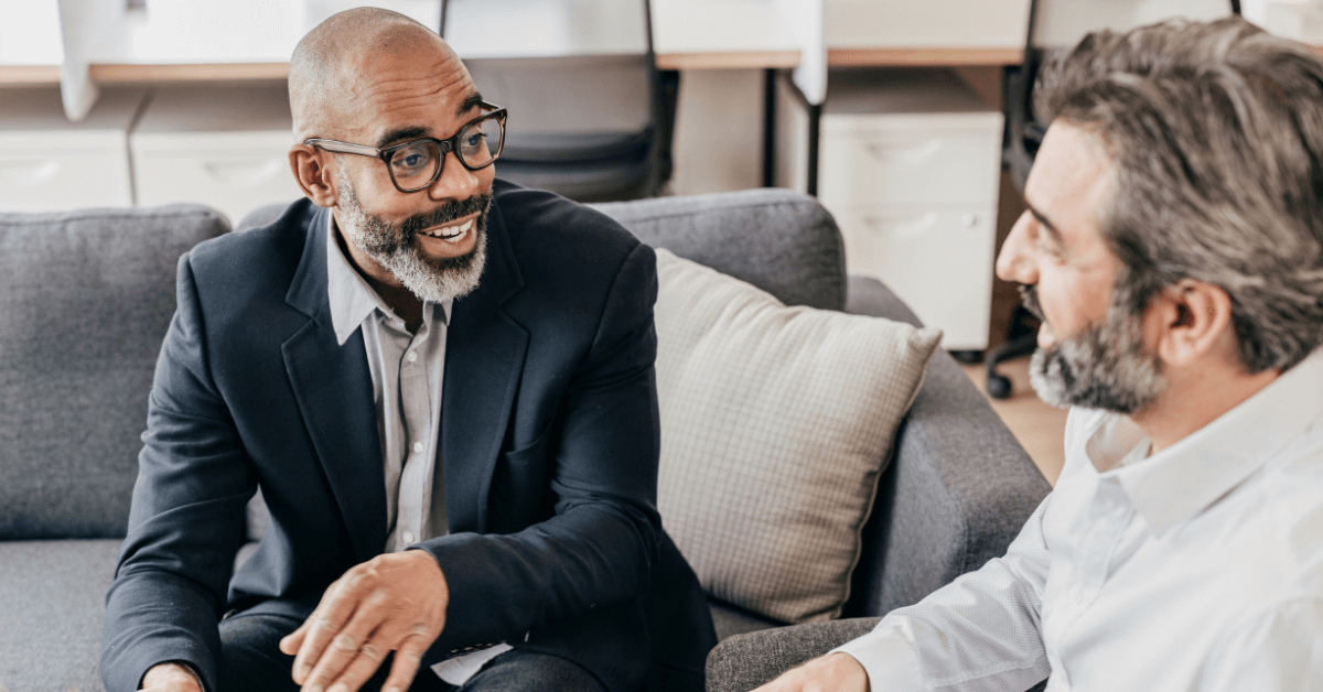 Two men performing tax preparation services